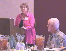 Bonnie Guzelf addresses audience